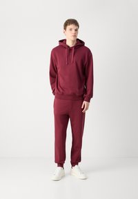 HUGO TRACKSUIT DAPODAYOTE SET - Treniņtērps - dark pink