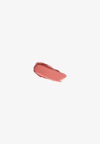 Smooth, curved swatch of muted pink lipstick with creamy texture on plain white background.