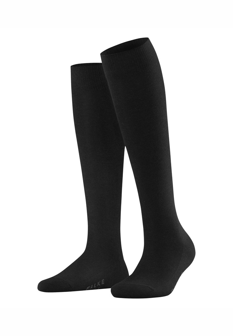 Põlveni ulatuvad mustad sokid, valmistatud siledast materjalist, ülaservas soonikkoeline tekstuur ja talla all brändinimi "FALKE".