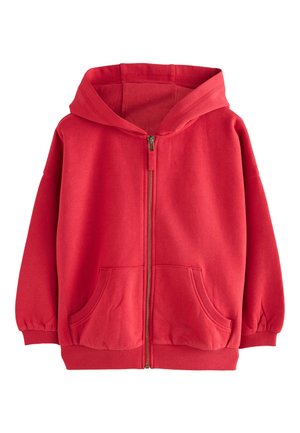 Next THROUGH  - Lukuga pusa - red