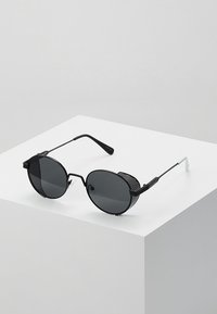 Sunheroes Lunettes de soleil - matt black/smoke