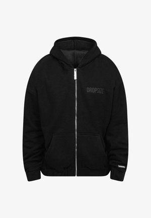 Must mustaga, kus on känguru tasku, millel on vasakul rinnal diskreetne "DROPSIZE" logo ja sile, tekstuuriga kangas.