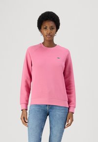 Lacoste Sportska majica - reseda pink