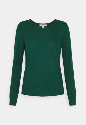 Chemise en coton vert à manches longues avec un col rond et une coupe ajustée. Texture lisse et construction simple sans motifs ni accents.