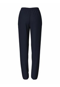 Navyblauwe broek met elastische tailleband in een relaxte pasvorm. Gemaakt van een zachte stof, met taps toelopende benen en minimale details.