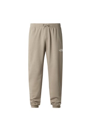 Hellbeige Sweatpants aus weichem Stoff, mit elastischem Bund und Kordelzug sowie Bündchen an den Fußgelenken. Kleines Logodetail.