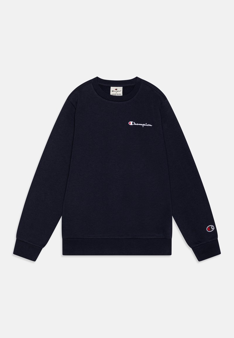 Sweat-shirt noir col rond avec manches longues, petit logo blanc Champion sur la poitrine et écusson logo sur le poignet gauche.