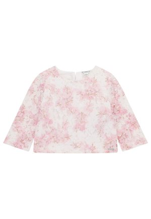 Langärmlige Bluse in Weiß mit floralem Muster in sanften rosafarbenen Tönen. Verfügt über einen runden Ausschnitt und eine kleine Öffnung auf der Rückseite zum Verschließen.