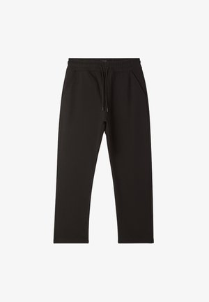 Pantaloni jogger neri con una texture morbida, vita elastica e coulisse regolabile. Presentano due tasche laterali per la comodità.