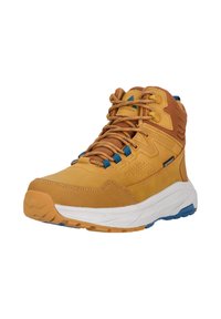 Kenkä vuoristoon, korkea malli, keltaisruskea nahka- ja tekstiilipäällinen, siniset yksityiskohdat, tekstuuripohja, pehmustettu nilkkapanta ja kestävä nauhoitusjärjestelmä.