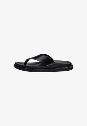 Black leather thong sandal with wide strap and cushioned sole, flat heel, and stitched edge detail, shown in side profile.