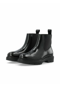 Svarta Chelsea-boots i glänsande läder med elastiska sidopaneler, rund tå och texturerad gummisula med mönster av klackar.