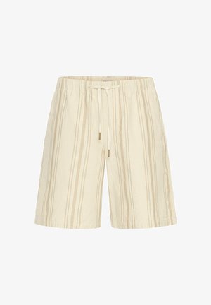 Beige striped shorts made of textured fabric, featuring an elastic waist with a drawstring and minimalistic design.
