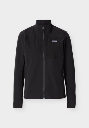 Jachetă Patagonia neagră cu fermoar integral, guler înalt, buzunar cu fermoar pe piept și două buzunare laterale cu fermoar, expusă pe fundal alb.