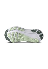Schuhsohle mit weißem Grund und grünen Akzenten, strukturierten Griffmustern und unterschiedlichen Profilen für verbesserte Traktion.