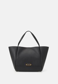 Black leather tote bag with a structured, angular shape. Features two handles, a logo plate, and a textured surface.