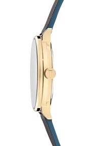 Orologio con finitura dorata e quadrante rotondo in vetro trasparente. Presenta un cinturino in pelle blu e un dettaglio testurizzato grigio. La vista laterale mostra un particolare coronato.