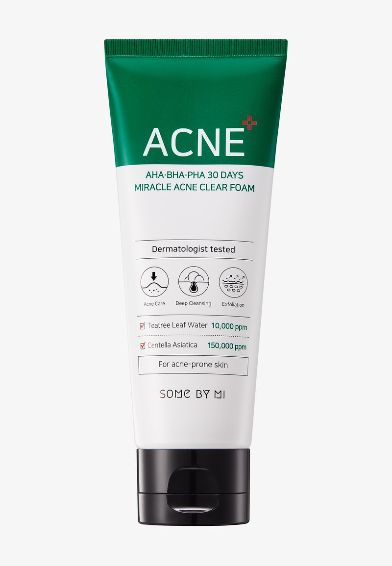 Tubetto bianco con tappo verde, etichettato "ACNE+ AHA-BHA-PHA Miracle Acne Clear Foam." Presenta icone per la cura dell'acne, pulizia profonda, esfoliazione.
