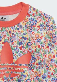 Blumiger Sweatshirt mit einem korallenfarbenen Rippenkragen. Verfügt über einen mehrfarbigen Blumenaufdruck mit einem auffälligen korallenfarbenen Trefoil-Logo. Weicher Stofftextur.
