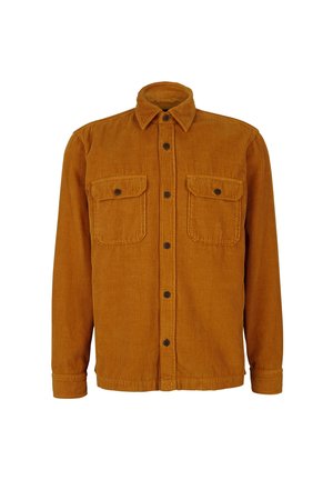 Camisa chaqueta de pana para hombre de manga larga en color naranja óxido con cierre de botones en la parte delantera y dos bolsillos en el pecho con solapa y botón.