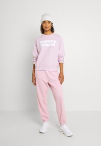 Levi's® PANTS - Trainingsbroek - winsome orchid