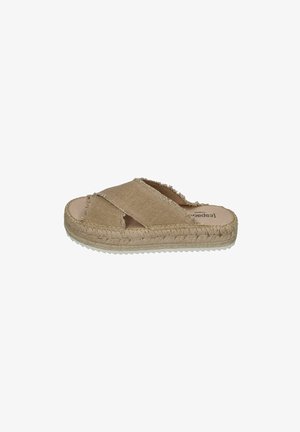 Beige slip-on sandal with frayed fabric crossed straps, woven platform sole, and white rubber tread outsole.