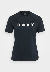 Zwarte rashguard met korte mouwen, gemaakt van stretchy materiaal, met een witte "ROXY" logo op de voorkant en een ronde halsontwerp.