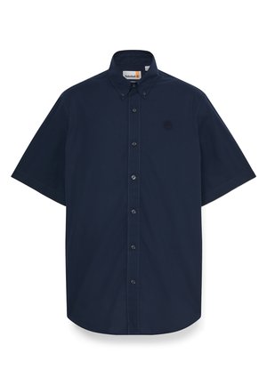 Camicia blu navy a maniche corte con colletto abbottonato, bottoni frontali e logo ricamato sul petto. Realizzata in tessuto di cotone liscio.