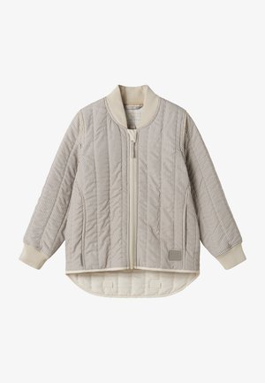 Μπεζ και άσπρο μπουφάν με κάθετες ρίγες, καπιτονέ, με ριμπ μανσέτες και γιακά, φερμουάρ μπροστά και επιμήκη στρογγυλεμένη πίσω ραφή.