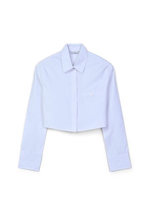 Camicia bianca a maniche lunghe, taglio corto, con colletto a punta, bottoni nascosti e una piccola tasca sul petto con bottone di Calliope, taglia piccola.