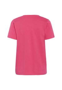 T-shirt en coton rose à manches courtes, col rond, texture lisse et ourlet droit. Pas de logos ni de motifs visibles.