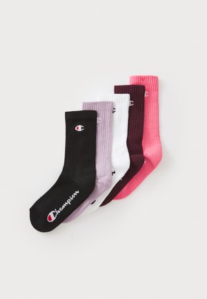 Viiden ribbed-sukan sarja mustana, laventelina, valkoisena, burgundina ja vaaleanpunaisena. Jokaisessa on Champion-logo sivussa.