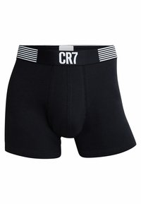 Black boxer shorts made from soft fabric. Features a thick waistband with a white "CR7" logo and horizontal striped design.