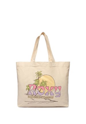 Beige shopper-taske med to håndtag, med et design af grønne palmer, gul sol og ordene "ROXY sunsets chaser" i pink og lilla bogstaver.