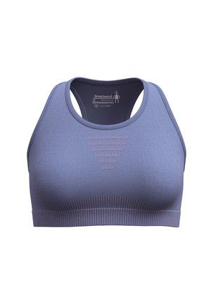 Lilla sports-bh med et sømløst design, rund halsudskæring og brede stropper. Har teksturerede mønstre og en ribbet bundkant.