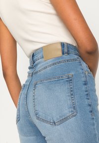 Denim Project CARO FLARED JEANS - Zvonové džínsy - light blue