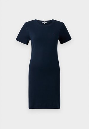 Robe t-shirt en coton bleu marine, à manches courtes, encolure ronde, longueur genou. Présente un petit logo sur la poitrine et une texture lisse.