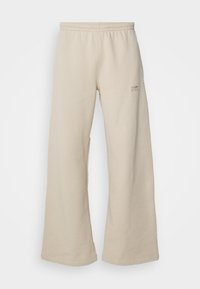 LOUNGE PANTS UNISEX - Trainingsbroek - white pepper
