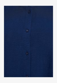 Unselected, navy blazer