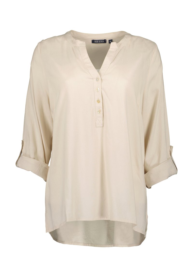Blusa beige a maniche lunghe con scollatura a V e patta di bottoni, con maniche arrotolate e orlo curvo. Tessuto morbido con una leggera lucentezza.