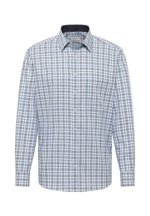 Chemise à manches longues avec un motif à carreaux bleu, blanc et noir, avec une poche avant sur le côté gauche.