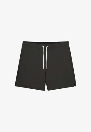 Černé plavecké šortky vyrobené z hladkého materiálu, s elastickým páskem na tkaničku a malými bočními rozparky pro lepší pohyblivost.