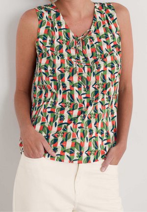 Hihaton pusero, joka on valmistettu kevyestä kankaasta ja jossa on värikäs kukka- ja geometrinen kuvio vihreänä, punaisena ja sinisenä, sekä avainreikämäinen pääntiedetaili.