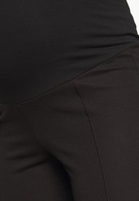 MAMALICIOUS MLLUNA PINTUC FLARED PANT - Calças - black