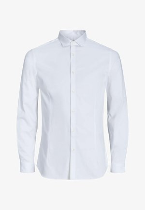 Camicia bianca a maniche lunghe con colletto, chiusura frontale con bottoni e texture in cotone liscia. Presenta una vestibilità su misura e polsini con bottoni.