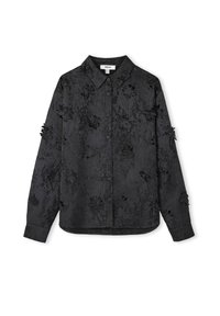 Zwarte shirt met een gevarieerd patroon, voorzien van bloemenapplicaties, volledig knoopsluiting en een klassieke kraag. Lange mouwen met manchetten.