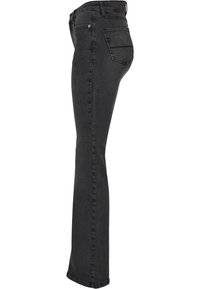 Svarta denimjeans med slim fit, rak benform, 5 fickor och subtila sömmar. Tyget har en slät yta.