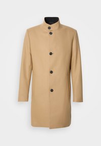 Sélectionné, medium beige