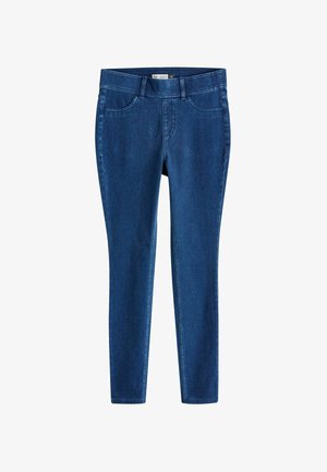 Kitsad denim teksad tumesinises. Omavad viit taskut, vööd, ning siledat tekstuuri kerge läikega. Õmblemise detailid õmblustel.