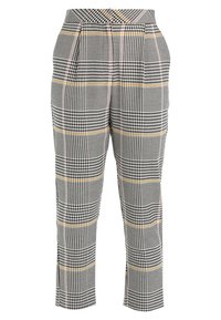 Pantaloni scozzesi in nero, bianco e giallo, con un fit su misura, pieghe sul davanti e lunghezza cropped. Tessuto morbido.